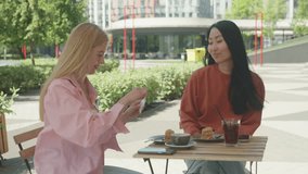 Surprise Jewelry Gift Between Friends At Outdoor Cafe - Powered by Shutterstock - Get 15% off with code: PIKWIZARD15