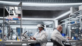 Woman expert in laboratory using VR headset to simulate experiment and research study. Virtual reality tech supporting microbiology and advanced medical discovery in healthcare. Camera A. - Powered by Shutterstock - Get 15% off with code: PIKWIZARD15