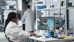 Diverse team of scientists collaborating in a modern laboratory, conducting experiments with laboratory equipment. Research study for biotechnology, genetics and molecular biology. Camera B. - Powered by Shutterstock - Get 15% off with code: PIKWIZARD15