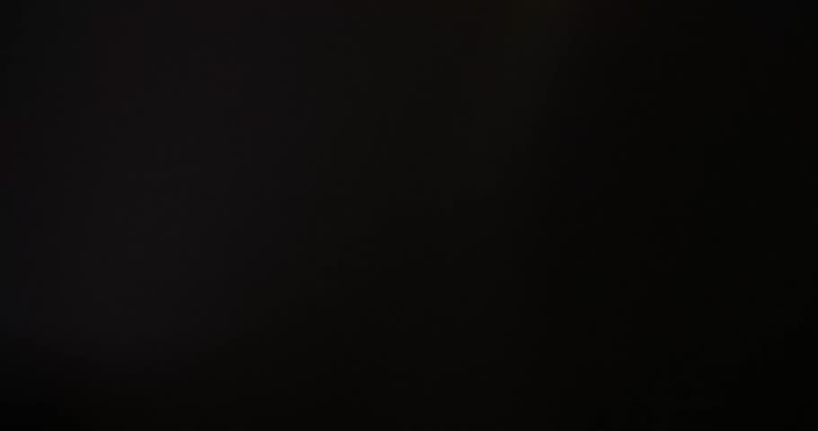 Epic amber transition with cascading orbs in 4K resolution, ideal for blockbuster trailers, epic storytelling, or high-production value edits.