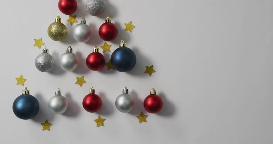 Thin blue outline tracing map continents HUD pulsing icons baubles aligning into tree marking data. Global, festive, digital, geometric, celebration, holiday, winter