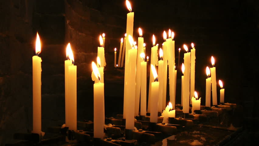 Burning candles in Saint Peter Church, Portovenere
