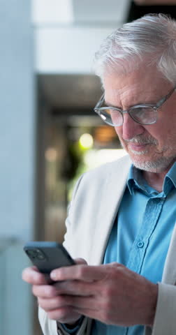 Smile, phone and research with business man in office for event planner, gallery coordinator and news. Reading, museum host and notification with mature person for expo and showroom planning