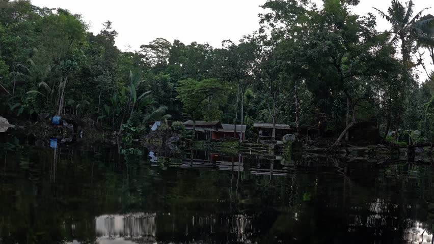 From the water, it appears on the surface of the water in a clear lake.