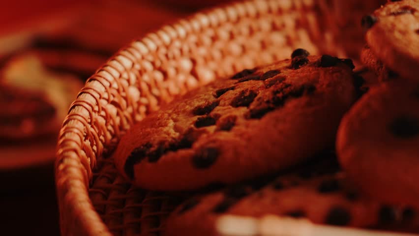 Freshly baked chocolate chip cookies in a cozy kitchen setting for a sweet treat