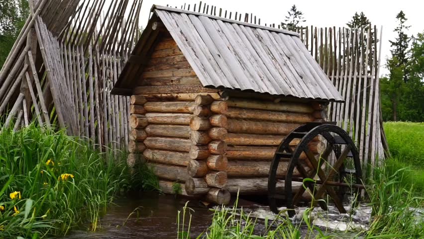 Water Mill in a Green Meadow