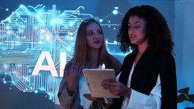 Two female IT developers stand explaining how to use a data management system, business intelligence, data statistics, marketing analysis, and behind a slide on a conference room screen. - Powered by Shutterstock - Get 15% off with code: PIKWIZARD15