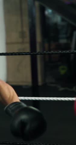 Boxing, exercise and sparring with people in gym together for combat or self defense training. Boxer, sports and strike with professional athletes in ring for fitness, power or workout routine