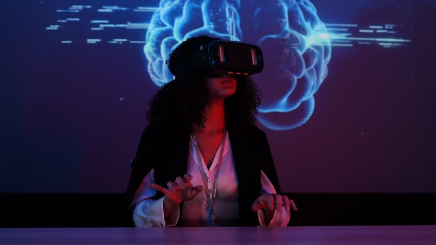 businesswoman wearing virtual reality glasses demonstrates how to use a data management system, business intelligence, data statistics, marketing analysis,key performance indicators  - Powered by Shutterstock - Get 15% off with code: PIKWIZARD15