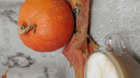 Autumn mood Harvest pumpkin maple leaves red and yellow make coffee Thanksgiving and Autumn decoration concept made from autumn leaves and pumpkin. Autumn Pumpkin Spice Latte. - Powered by Shutterstock - Get 15% off with code: PIKWIZARD15