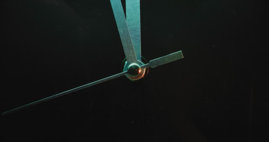 Close Up of Moving Clock Hands Showing Precise Time on Wall Clock with Futuristic Design. Modern Interior Decoration in Neon Light. Concept of Punctuality, Time Management, Waiting and Lifestyle.