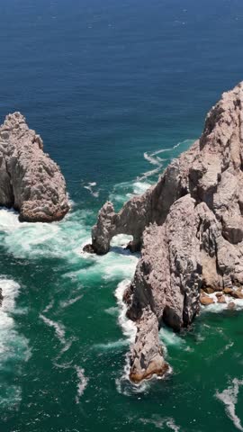Vertical Drone Shot of Natural Arch, Landmark of Cabo San Lucas, Baja California, Mexico