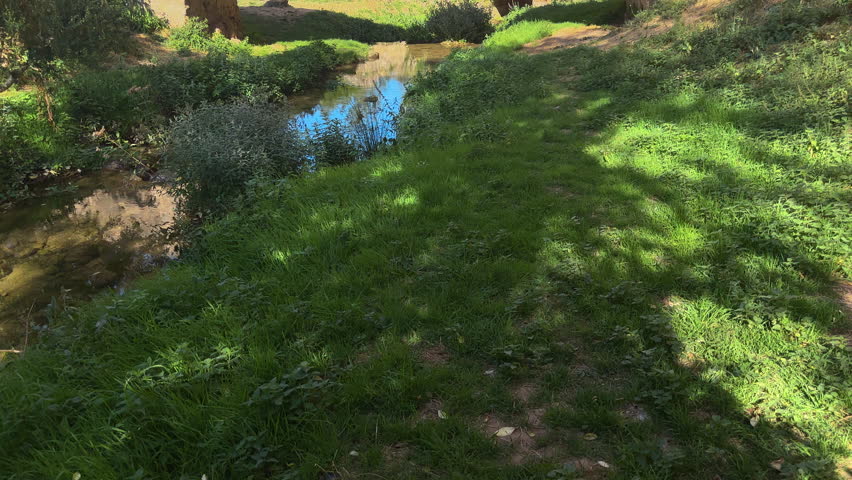 Scenic view of the medieval bridge at Santa Maria de la Hoz Hermitage, famous landmark in Burgos province, Spain. High quality 4k footage