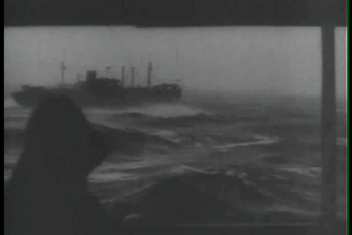 1950s - U.S. Army troops struggle through weather during the Korean War.