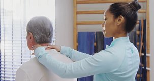 Therapist placing hands on patient's neck activating transparent overlay for real time tension data. Health, wellness, rehabilitation, biomechanics, digital interface, physical therapy - Powered by Shutterstock - Get 15% off with code: PIKWIZARD15