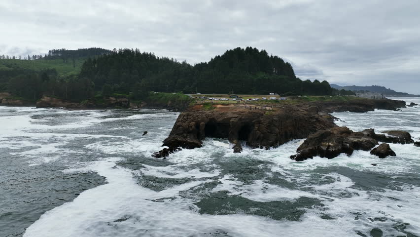 Aerial view close to rocks at the Boiler Bay State Scenic Viewpoint, in Oregon