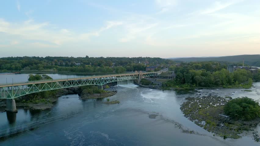 Scenic Turner Falls cascade under bridge in Massachusetts landscape