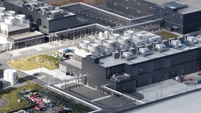 large data center facility, Coud services, big data and artificial intelligience infrastructure. Sainth Ghislain, Belgium. Aerial views. - Powered by Shutterstock - Get 15% off with code: PIKWIZARD15