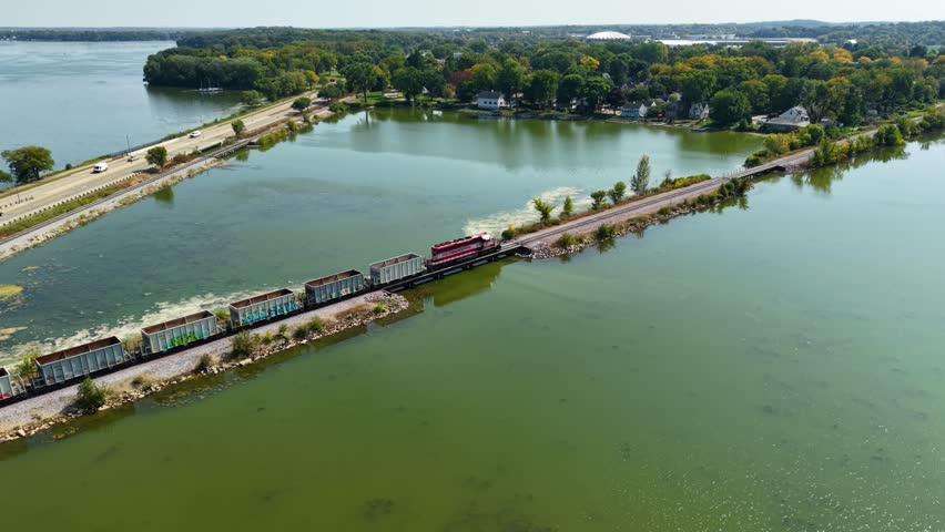 Train crosses aquatic bridge near Madison Wisconsin