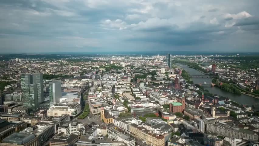 Aerial view of the frankfurt cityscape with the main river flowing through it