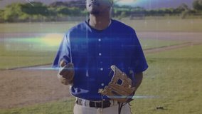 Baseball player practicing tossing ball into glove and catching on field with path guiding ball. Athlete, sports, outdoor, training, motion, focus, recreation - Powered by Shutterstock - Get 15% off with code: PIKWIZARD15