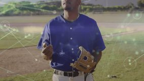 Baseball player on field initiating toss for fielding drill while tech overlay showing trajectory. Athlete, sports, activity, motion, outdoor, training, fitness - Powered by Shutterstock - Get 15% off with code: PIKWIZARD15