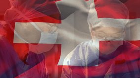 Two surgeons adjusting mask and consulting for surgery under transparent Swiss flag overlay. Medical team, healthcare, collaboration, sterile, professionalism, hospital, teamwork - Powered by Shutterstock - Get 15% off with code: PIKWIZARD15
