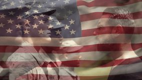 Instructor approaching recruit and checking insignia during military training under US flag overlay. Military, discipline, teamwork, endurance, leadership, rugged, outdoor - Powered by Shutterstock - Get 15% off with code: PIKWIZARD15