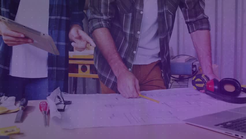 Man measuring blueprint while woman scrolling tablet causing animated graphs for design review. Collaboration, innovation, craftsmanship, technical, analysis, planning, productivity