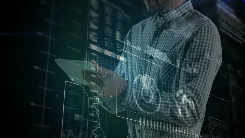 Man lifting tablet into view in data lab, tapping swiping charts gauge globe reviewing data. Technology, data visualization, innovation, futuristic, analytics, digital, interface - Powered by Shutterstock - Get 15% off with code: PIKWIZARD15