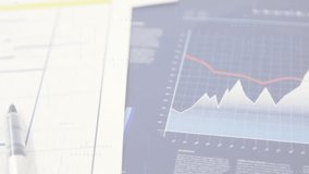 Handheld calculator sliding into frame after report reveal, highlighting cost analysis on desk. Financial analysis, office workspace, data visualization, business strategy, technology, productivity, - Powered by Shutterstock - Get 15% off with code: PIKWIZARD15