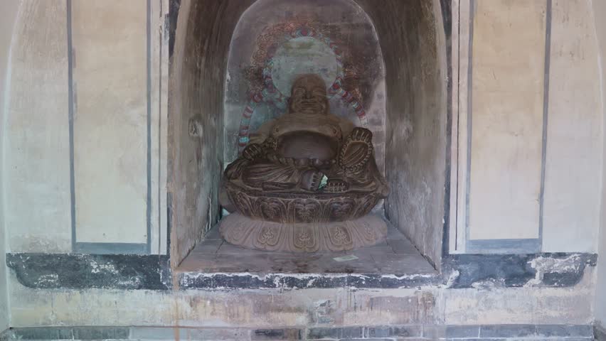 Painted Buddha Statues and Artifacts at Zhen Guo Temple, Pingyao, Shanxi Province, China