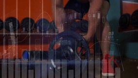 Man selecting plate and performing landmine row in gym, tracking fitness with animated charts. Strength training, gym equipment, fitness workout, data visualization, athleticism, workout environment, - Powered by Shutterstock - Get 15% off with code: PIKWIZARD15