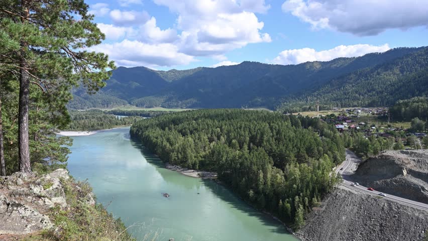 Timelapse of the Katun River flowing among the mountains. Altai Republic, Russia
