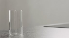 Slow motion zoom out blueberry juice pour in highball glass on kitchen countertop - Powered by Shutterstock - Get 15% off with code: PIKWIZARD15