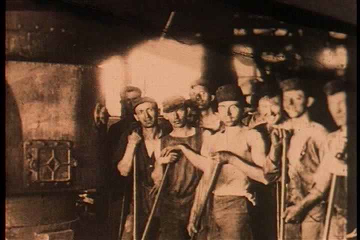 1920s - Steel workers in a factory ion 1928.