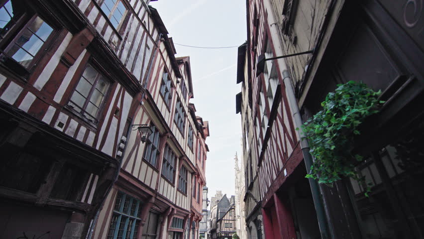 Rouen France cityscape showing historic streets with beautiful facades of buildings in tourist European city urban architecture travel.