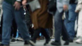 Close up of people walking on crowded street in slow motion. - Powered by Shutterstock - Get 15% off with code: PIKWIZARD15