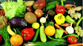 Creative Stop-Motion of Fresh Fruits and Vegetables on Chalkboard Forming 'VITAMIN D' Text - Powered by Shutterstock - Get 15% off with code: PIKWIZARD15