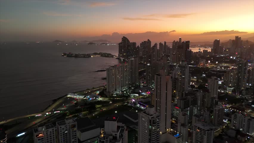 PANAMA CITY, PANAMA -The skyline of Panama City with its skyscrapers in the financial district at sunset. March 26, 2023