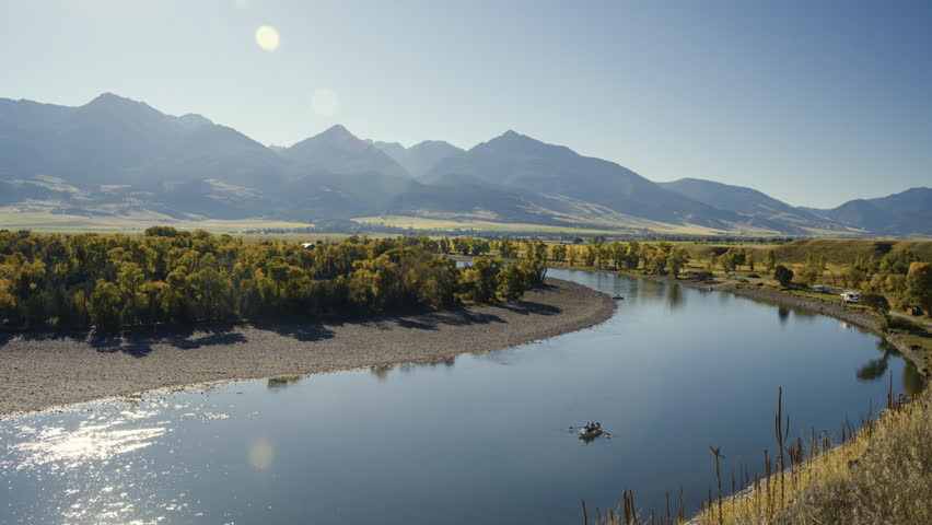 Pan of Absaroka Mountains Towering over Yellowstone River Anglers
