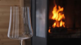 White wine pouring near fireplace creates a cozy mood glowing reflections emphasize coziness and warmth Scene of intimate relaxation where coziness defines luxury harmony and timeless celebration - Powered by Shutterstock - Get 15% off with code: PIKWIZARD15