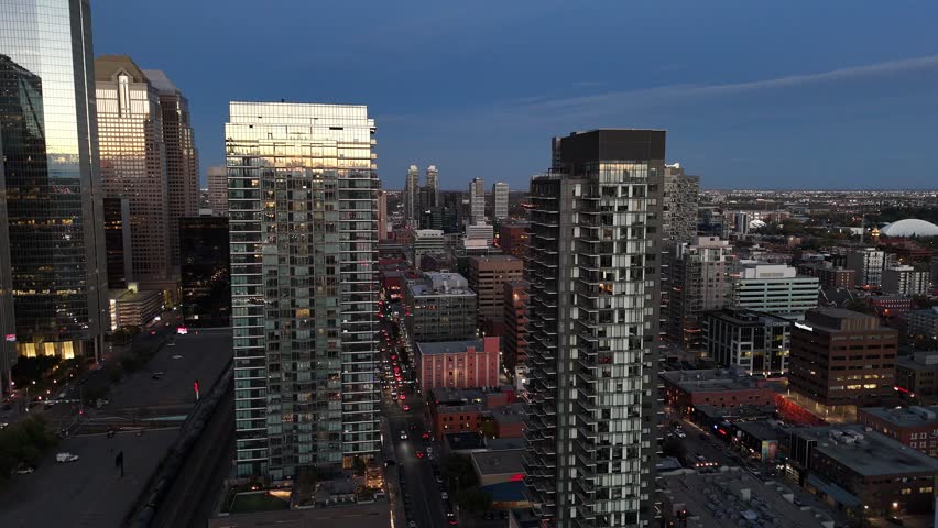 Aerial view of skyscrapers on the west end of downtown at night in Calgary, Alberta