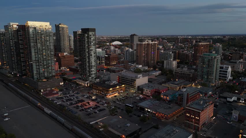 Aerial view of skyscrapers on the west end of downtown at night in Calgary, Alberta