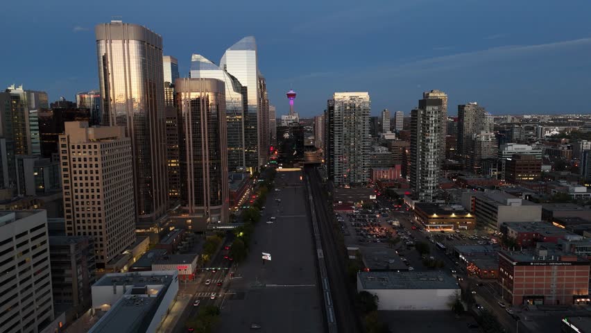 Aerial view of skyscrapers on the west end of downtown at night in Calgary, Alberta