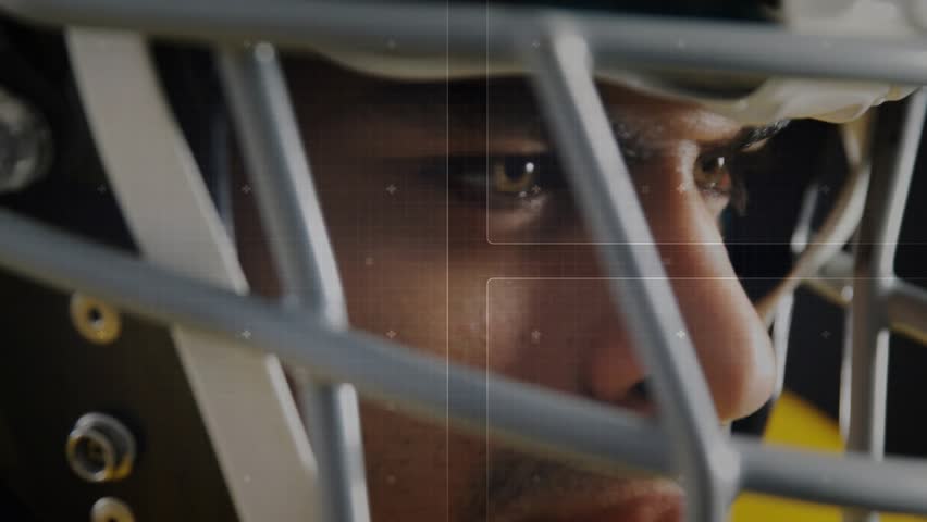 Streaming code overlays flickering around helmet initiating sport tech analysis of focused athlete. Cybersecurity, innovation, hi-tech, athleticism, futurism, data visualization, digital interface