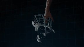 Athlete gripping football helmet activating HUD overlay over grid wall demonstrating technology. Sports, innovation, futurism, technology, athletic gear, digital interface, cyber - Powered by Shutterstock - Get 15% off with code: PIKWIZARD15