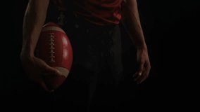 Football player cradling ball, lifting head showing helmet glitching ACCESS DENIED pulsing lines. Athlete, sports, digital, futurism, cybersecurity, technology, innovation - Powered by Shutterstock - Get 15% off with code: PIKWIZARD15