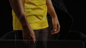 Male athlete guiding football helmet into position, data interface sliding on chest for sports tech. Athlete, technology, sportswear, digital, futuristic, performance, e-sports - Powered by Shutterstock - Get 15% off with code: PIKWIZARD15