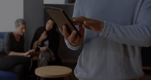 Man entering tech lounge and tapping tablet screen, generating floating code for data analysis. Technology, collaboration, innovation, digital, workspace, analytics, futuristic - Powered by Shutterstock - Get 15% off with code: PIKWIZARD15